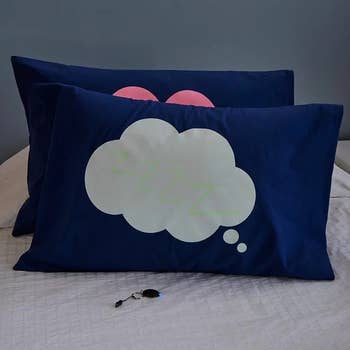 Two bluish pillows with a unreality and