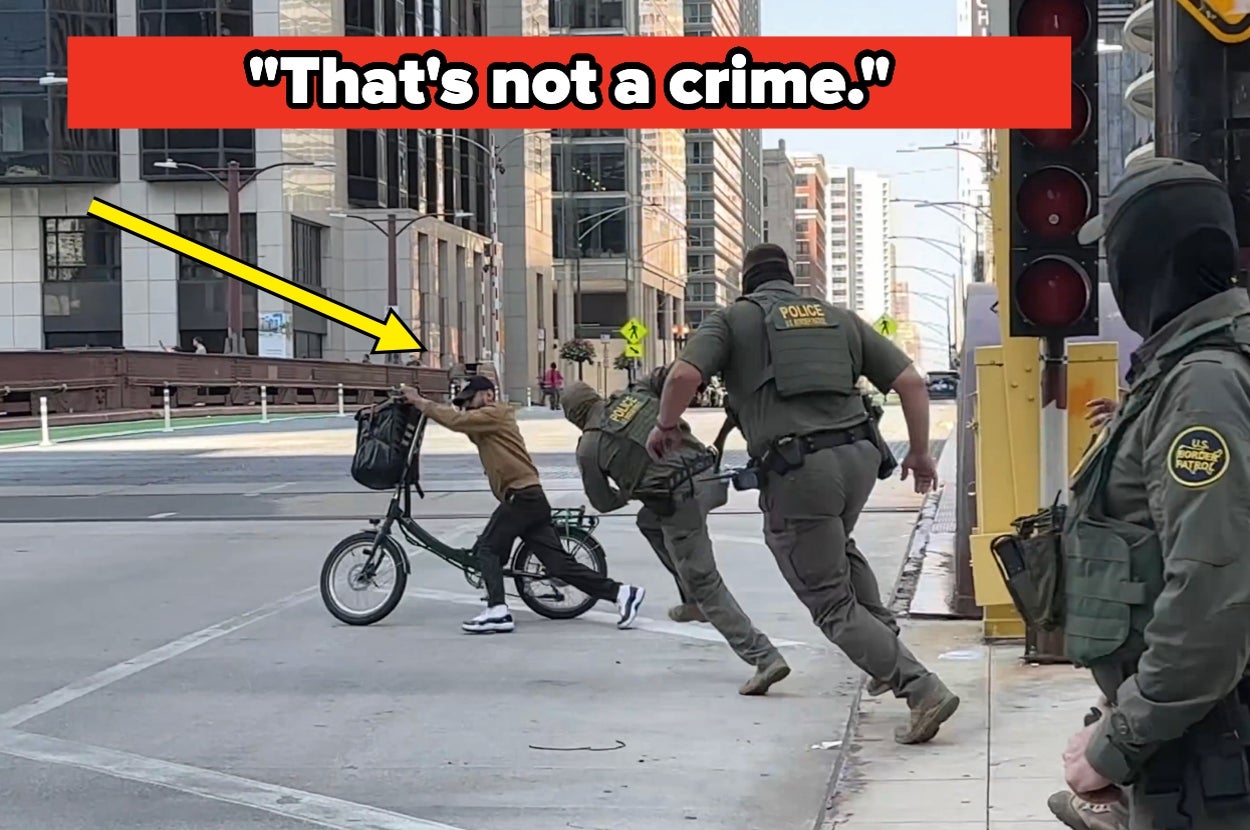 A person on a bike being chased by officers in tactical gear on a city street. A text overlay reads, "That's not a crime."