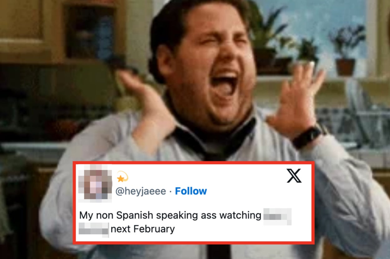 Person laughing with joy in a kitchen. Overlay text: Non-Spanish speaker humor about watching something in February