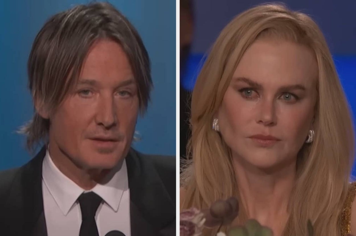 Two people at a formal event. The person on the left has shoulder-length hair and a suit. The person on the right has long hair and elegant attire