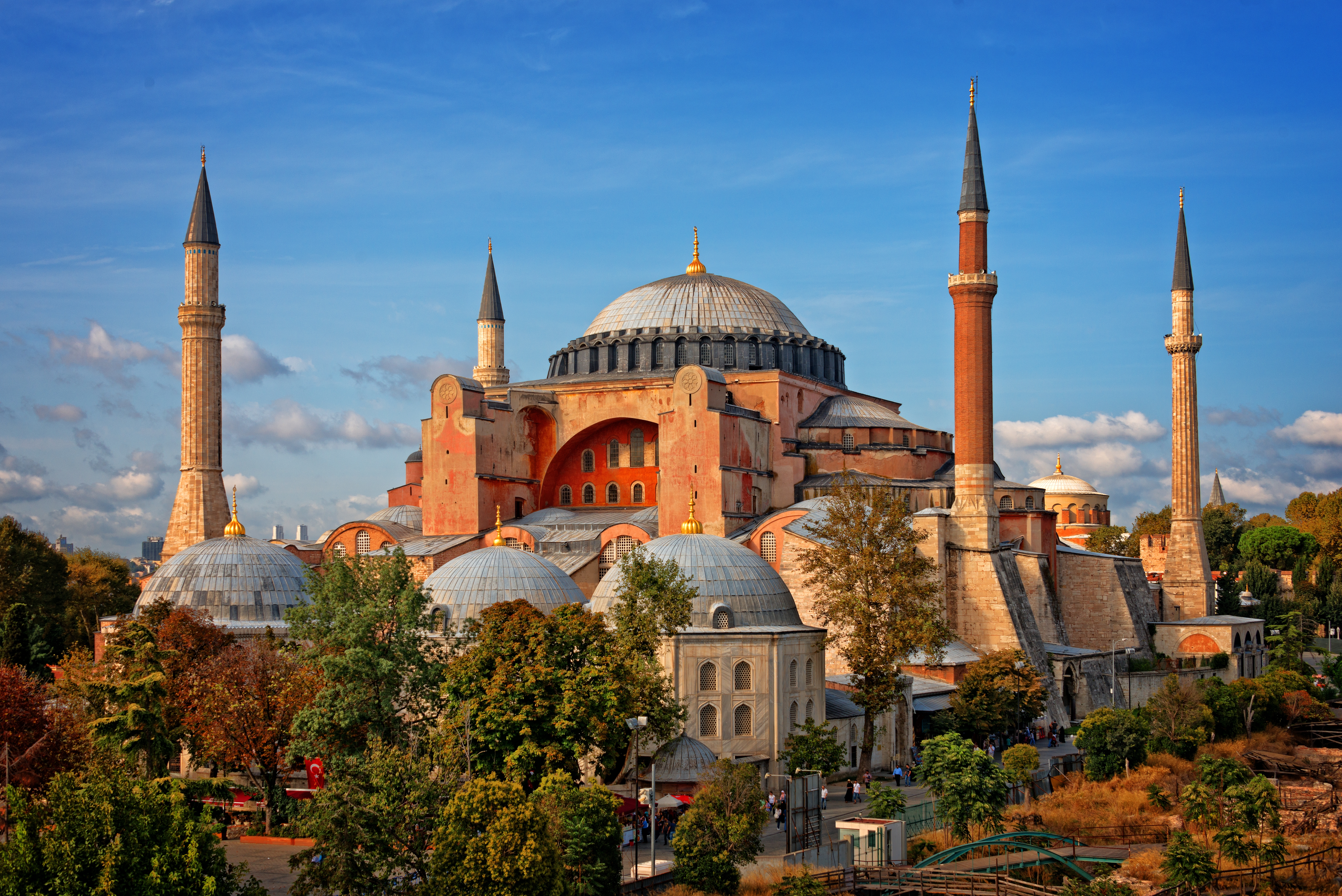 Hagia Sophia exterior with minarets, erstwhile cathedral and mosque, present museum, nether a partially cloudy sky