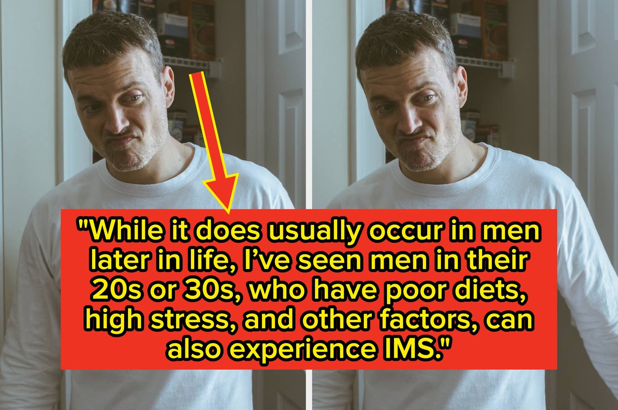 Man in a casual white long-sleeve shirt standing in a kitchen with a lighthearted expression