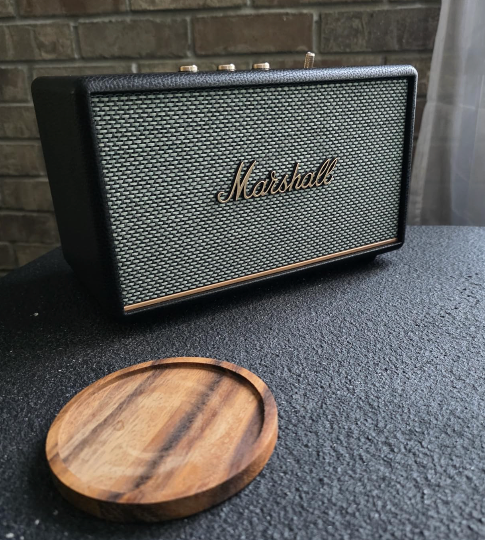 Rectangular Marshall talker  connected  a array  adjacent  to a circular woody  coaster