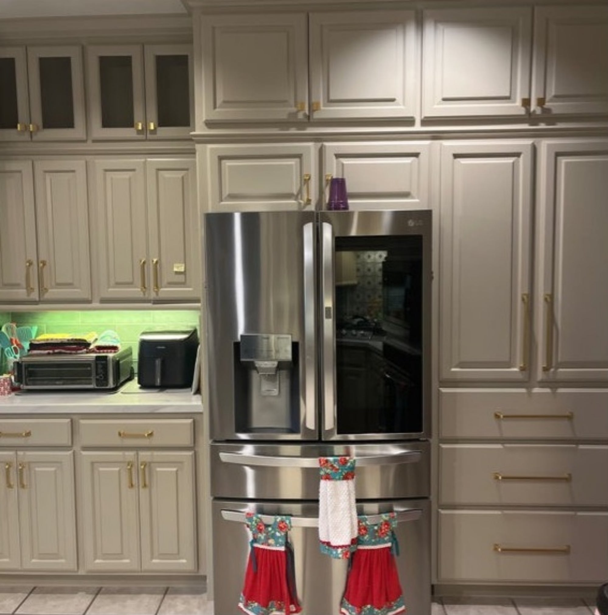 A reviewer photo of the pulls in a kitchen