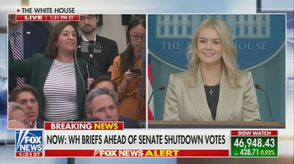 "I've Never Met You": Karoline Leavitt Was Truly Shocked By This Bold Question From The Latinos For Trump Founder 13 Split-screen TV broadcast with a government press briefing on the left and a speaker at the White House podium on the right. News ticker below