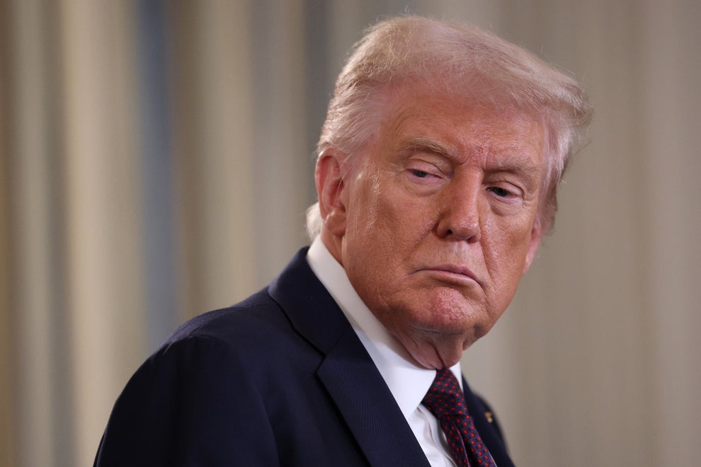 "I've Never Met You": Karoline Leavitt Was Truly Shocked By This Bold Question From The Latinos For Trump Founder 9 A person in a suit looks to the side with a serious expression, indoors, against a neutral background