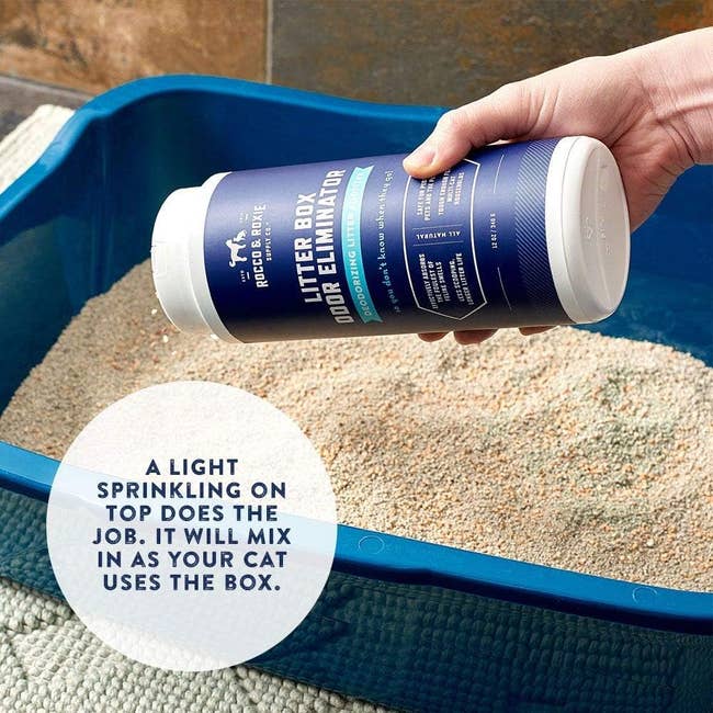 Hand holding a container labeled 