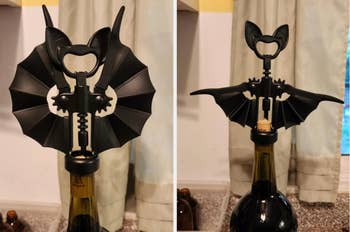 Bat-winged vessel opener connected a vino bottle, demonstrating wings closed and unfastened for a modern, spooky room accessory