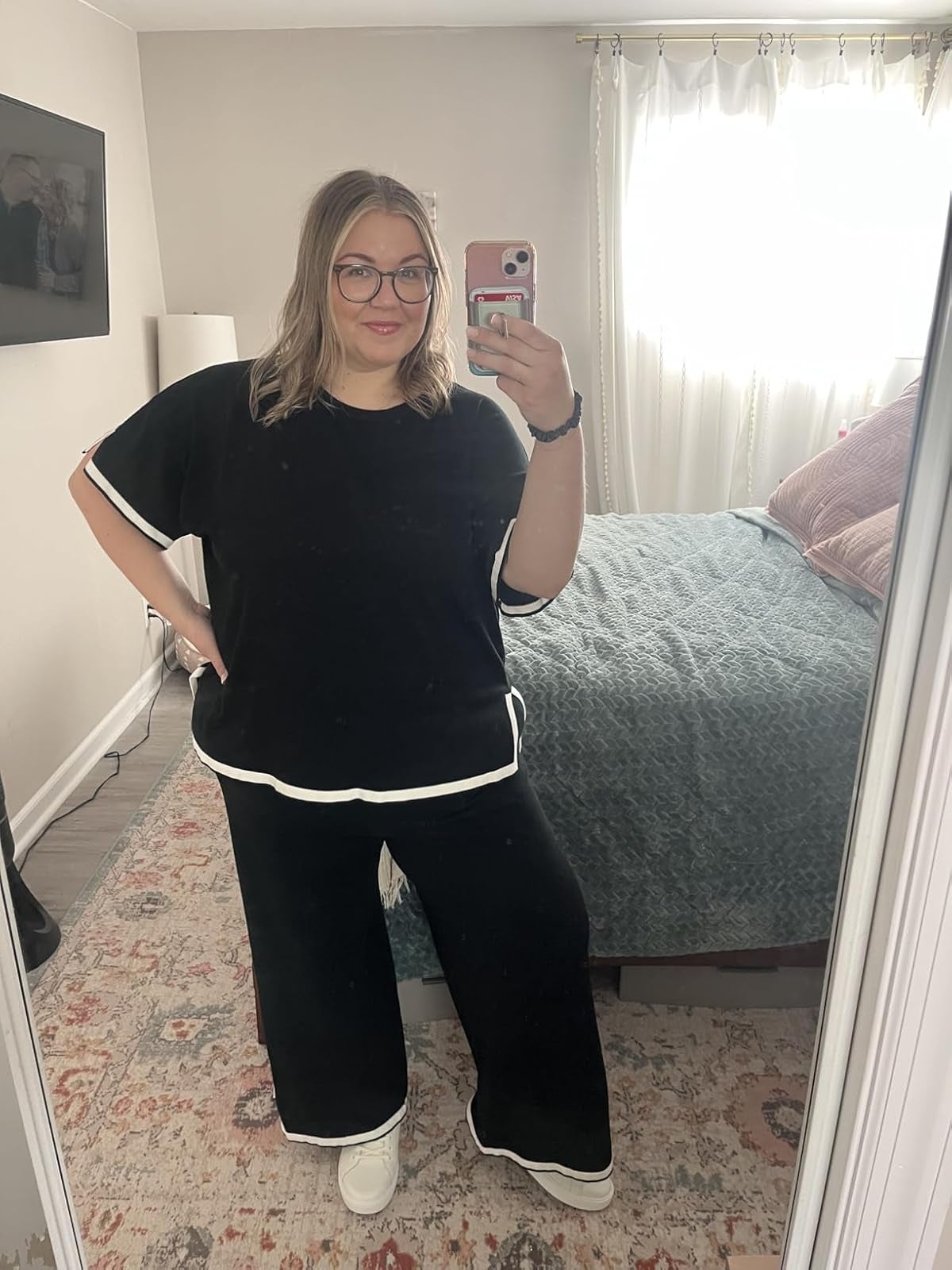 Person taking a reflector  selfie successful  a casual, escaped   achromatic  outfit with achromatic  trim