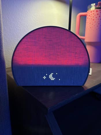 the hatch glowing purple astatine night