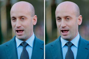 stephen in a blue suit and tie speaks outdoors, with a neutral background