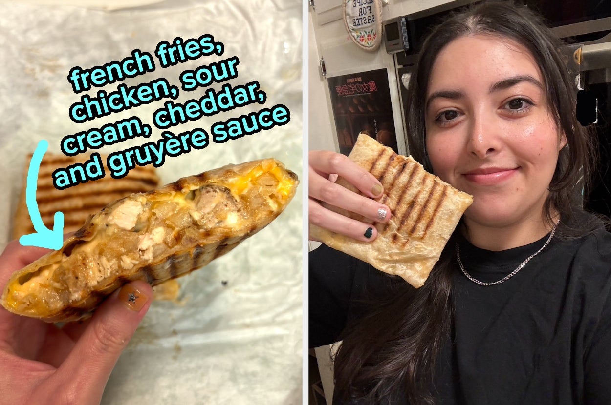 Person holding grilled wrap, showing an inside view filled with fries, chicken, sour cream, cheddar, and Gruyère sauce