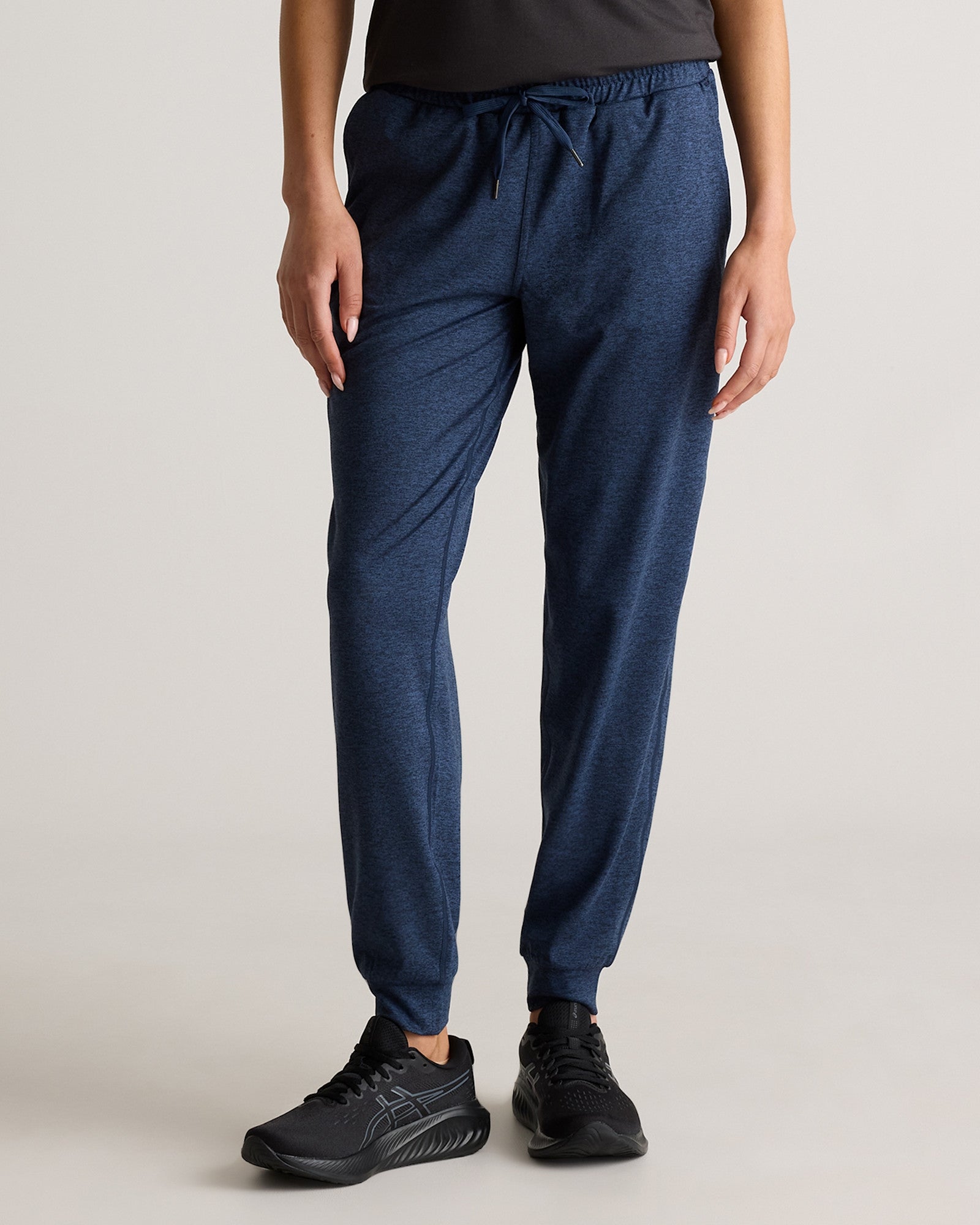 Person lasting  successful  casual joggers and sneakers, showcasing comfy  athletic