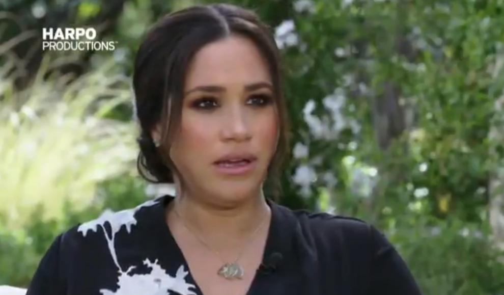 21 Low-Key Ridiculous Things Celebs Did For Money, Clout, Or Attention 82 A close up of a woman with her dark hair pulled back into a bun is in mid sentence while seated