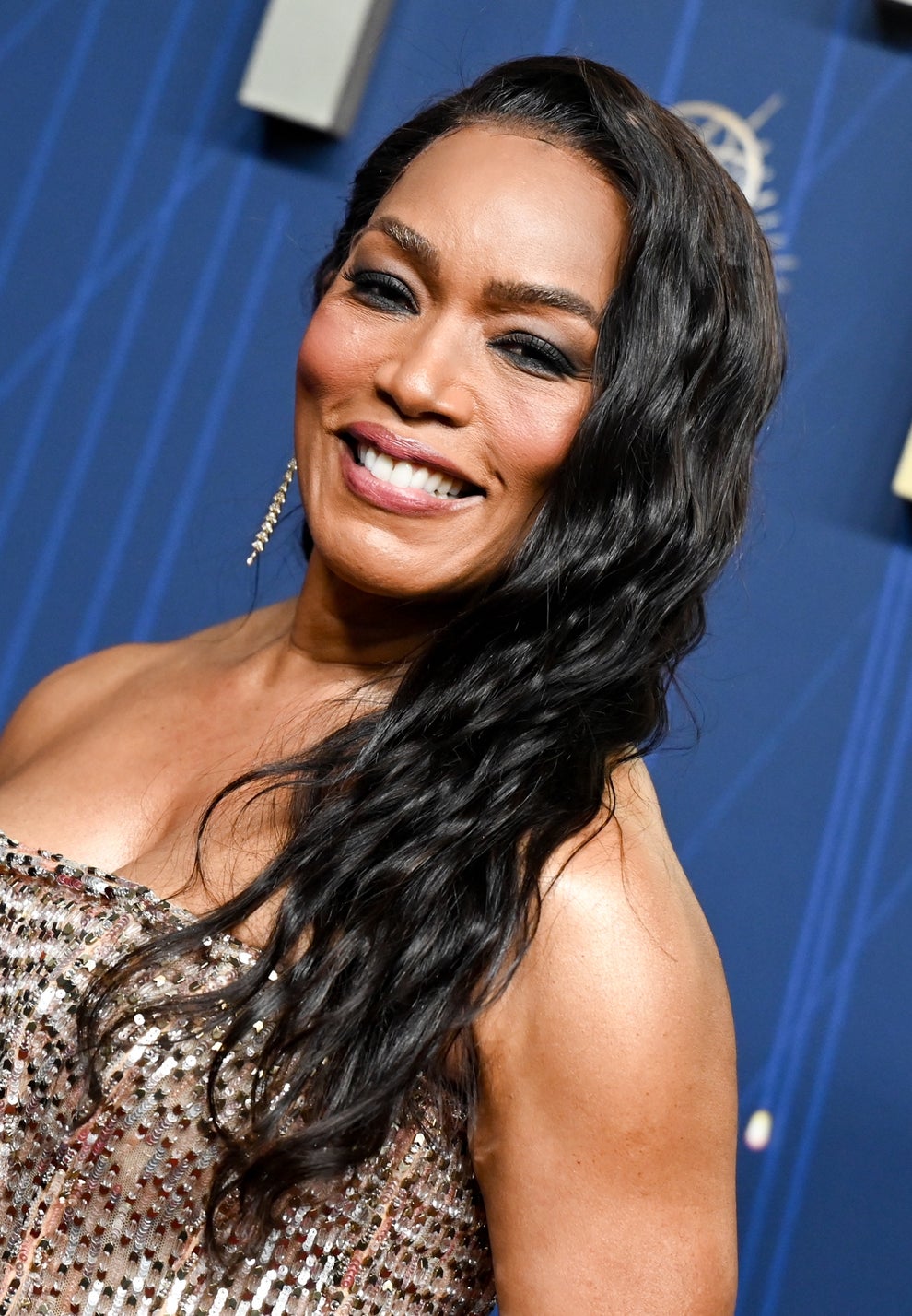 21 Jaw-Dropping "Then And Now" Photos Of Celebrities Who Have Gotten Wayyyyy Sexier With Age 22 Smiling woman on red carpet in elegant, sequined strapless gown with long, flowing hair