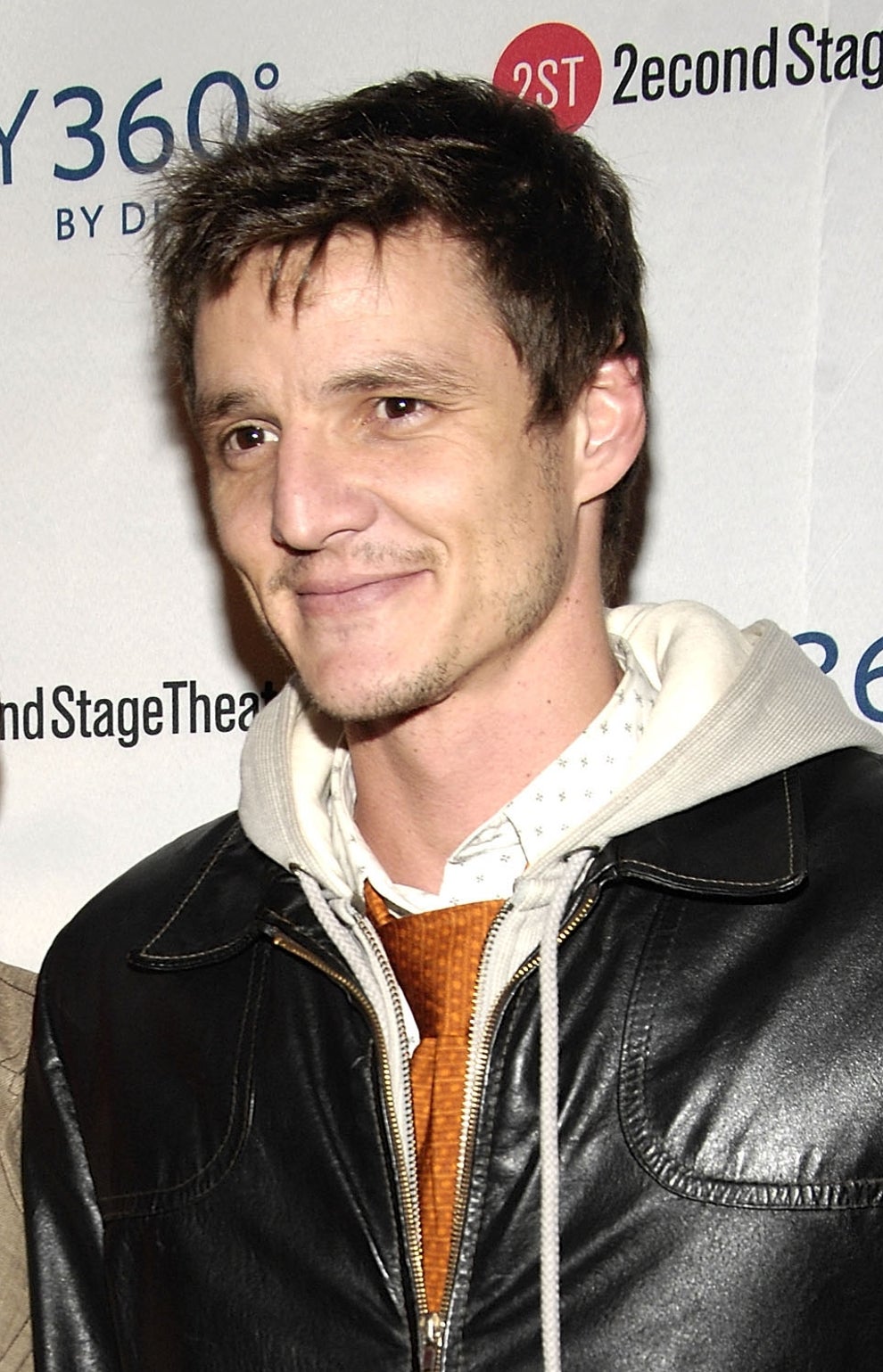 21 Jaw-Dropping "Then And Now" Photos Of Celebrities Who Have Gotten Wayyyyy Sexier With Age 28 Two people posing at an event. One in a casual leather jacket and jeans, the other in a blazer and scarf, smiling at the camera