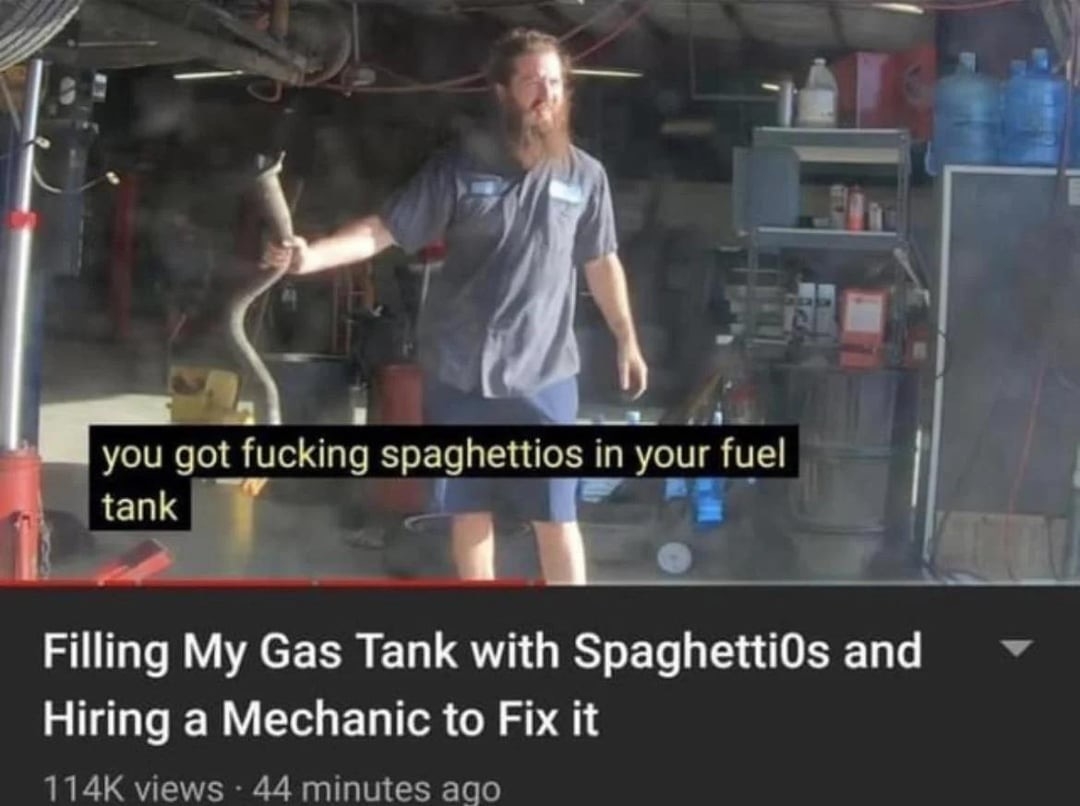 A mechanic stands in a garage, reacting to a car issue. Caption reads: &quot;you got spaghetti0s in your fuel tank.&quot;