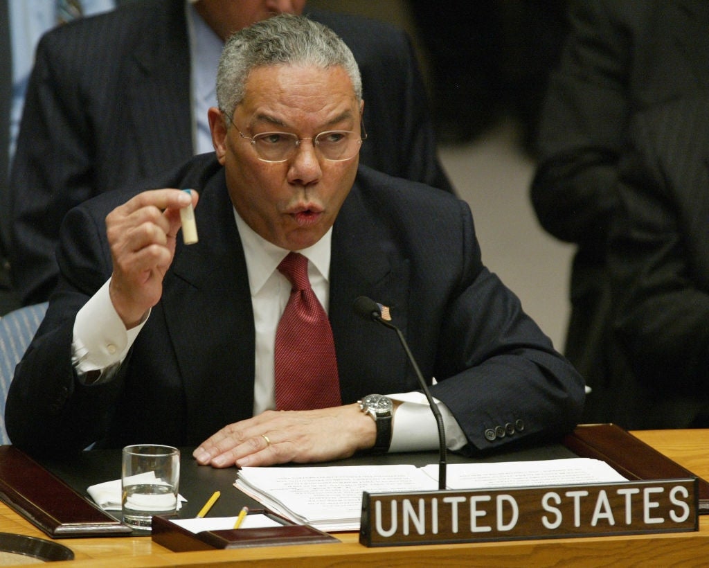 Powell speaking to the UN, holding up   a vial of anthrax
