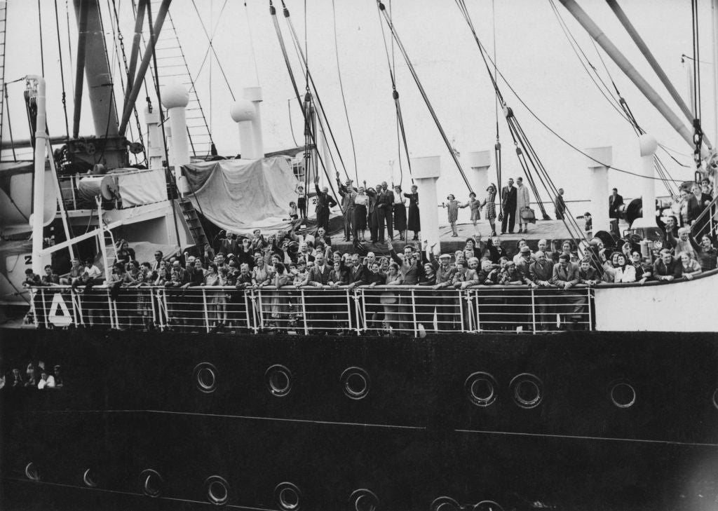 boat afloat  of refugees