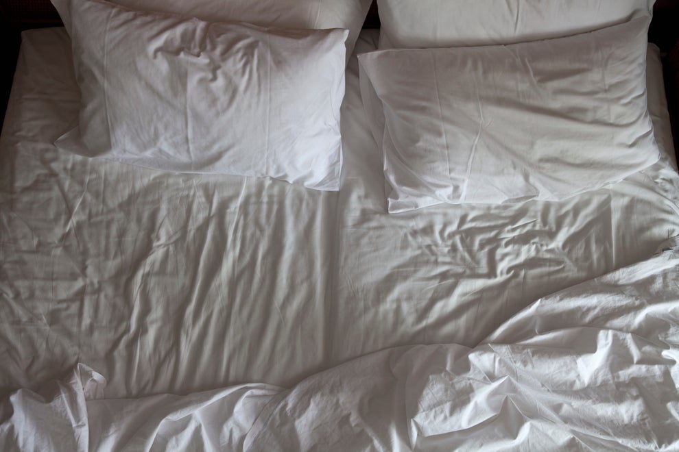 I Actually Think I Lost All Faith In Men After Learning Some Of The Things Women Have Accidentally Found In Men's Homes 8 Unmade bed with two pillows and rumpled sheets, suggesting intimacy or shared moments