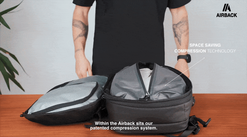 Person demonstrating a backpack with compression strategy   for space-saving. Text highlights 