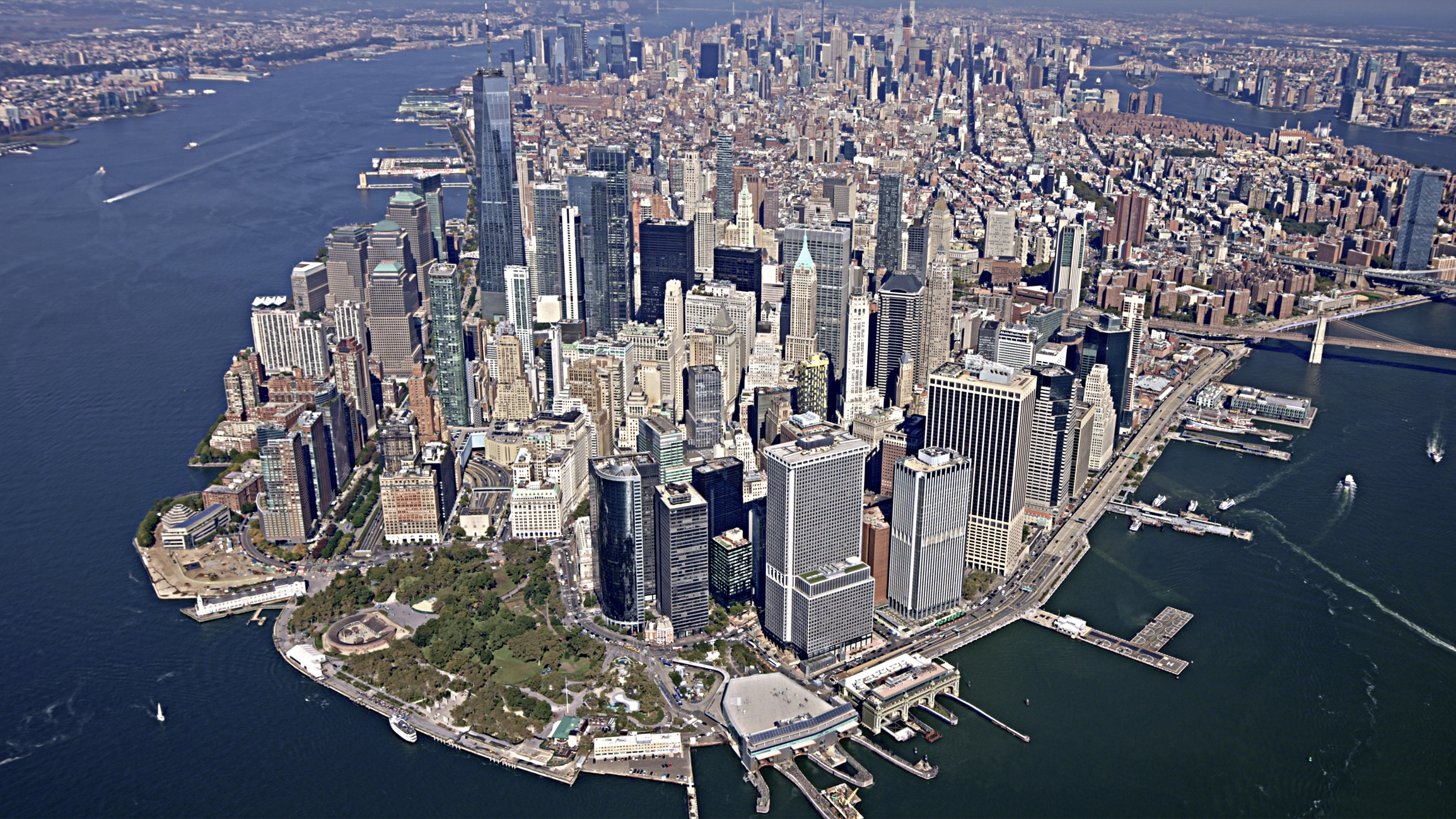 Aerial view of Manhattan, New York City, showcasing the dense urban skyline and surrounding waters