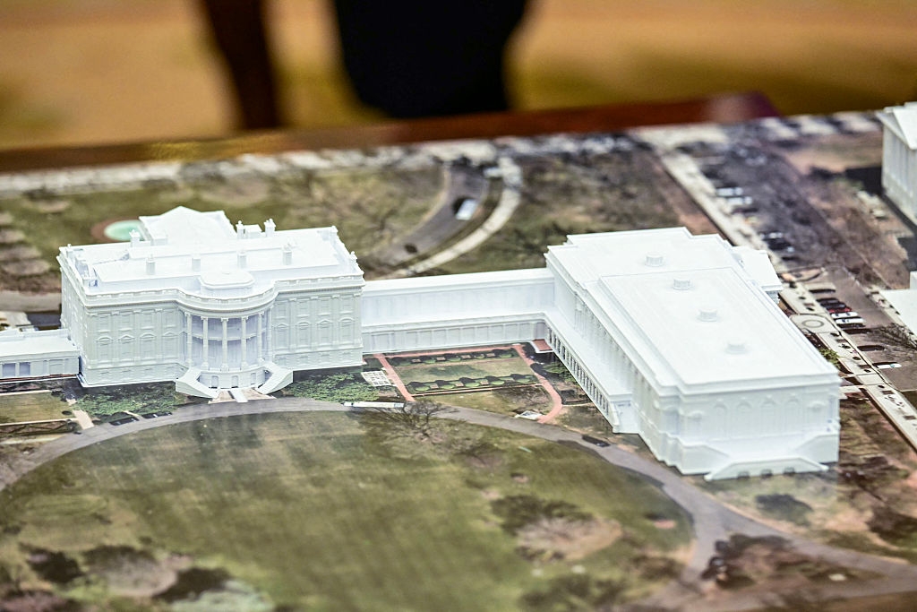 Model of a historic building displayed on an aerial map, showcasing architectural layout and surrounding landscape