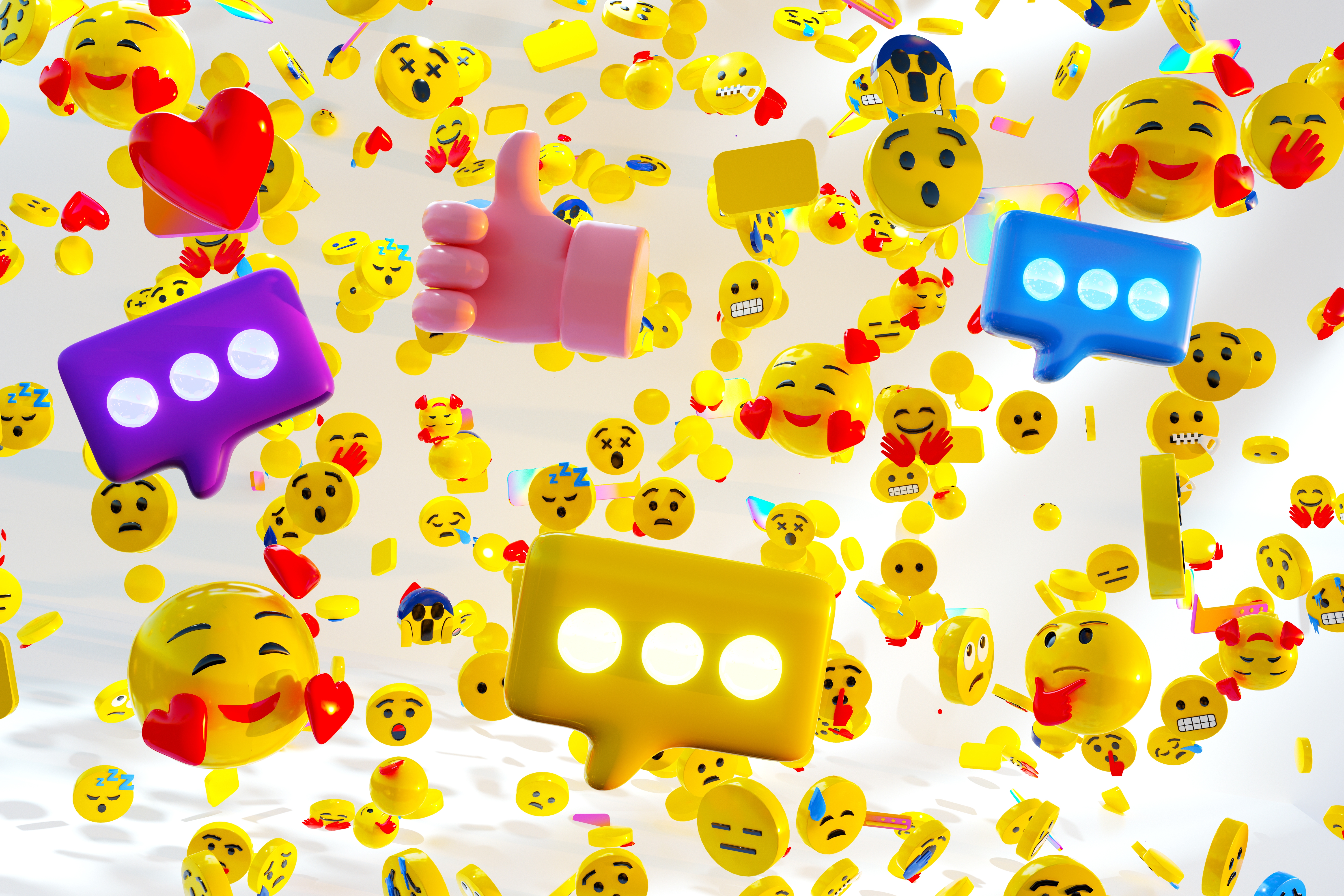 Flytende emojier, inkludert smilende, hjerteøyne og tommelen opp, ispedd fargerike chattebobler, på en lys bakgrunn