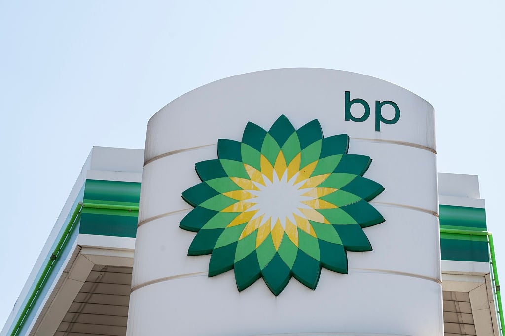 BP logo connected  a gathering  facade, featuring a greenish  and yellowish  sunburst plan  with the letters "bp" disposable   supra  it