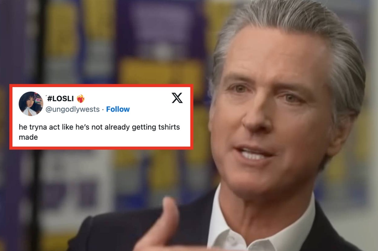 A person in a suit gestures during an interview. A tweet overlay reads, "he tryna act like he's not already getting tshirts made."