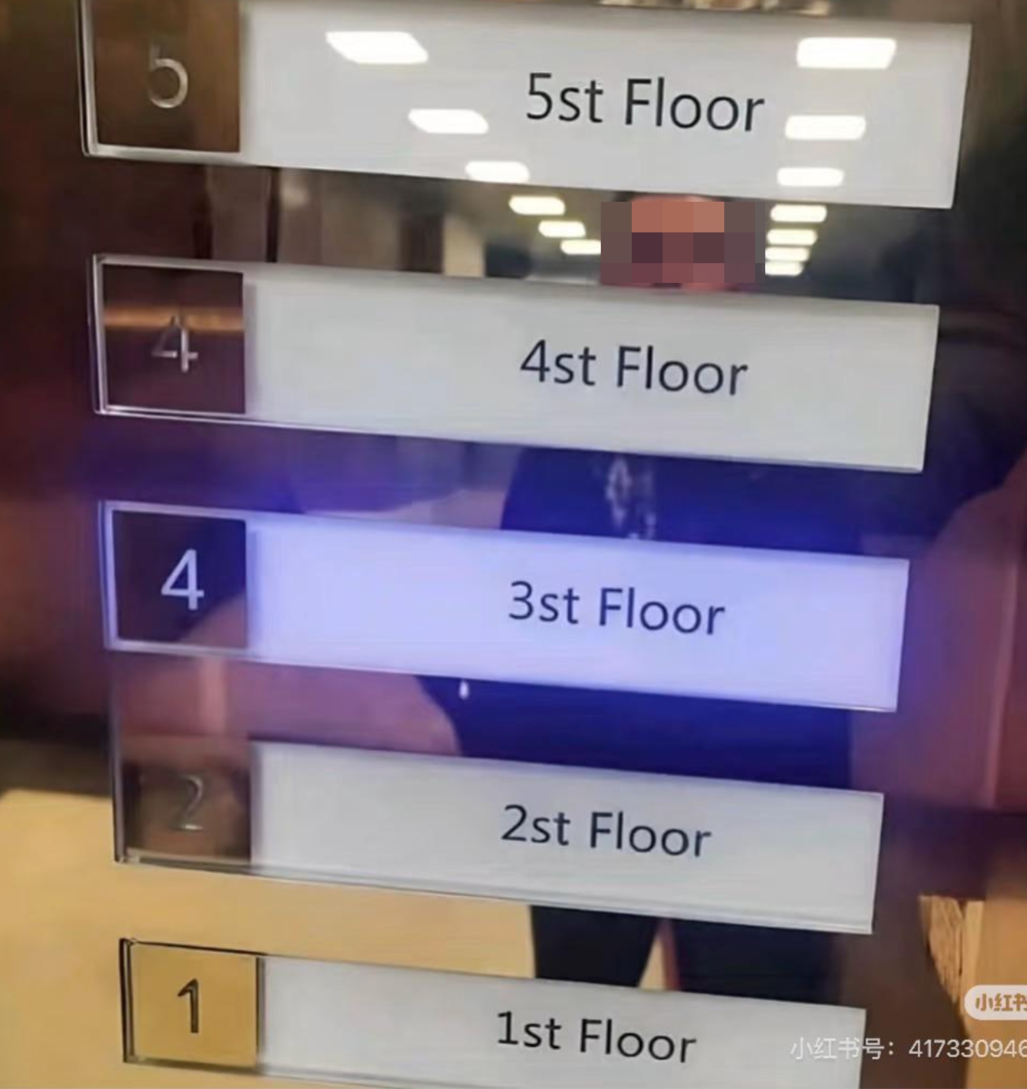 Elevator buttons labeled from "1st Floor" to "5st Floor," showing English spelling errors successful  each   label