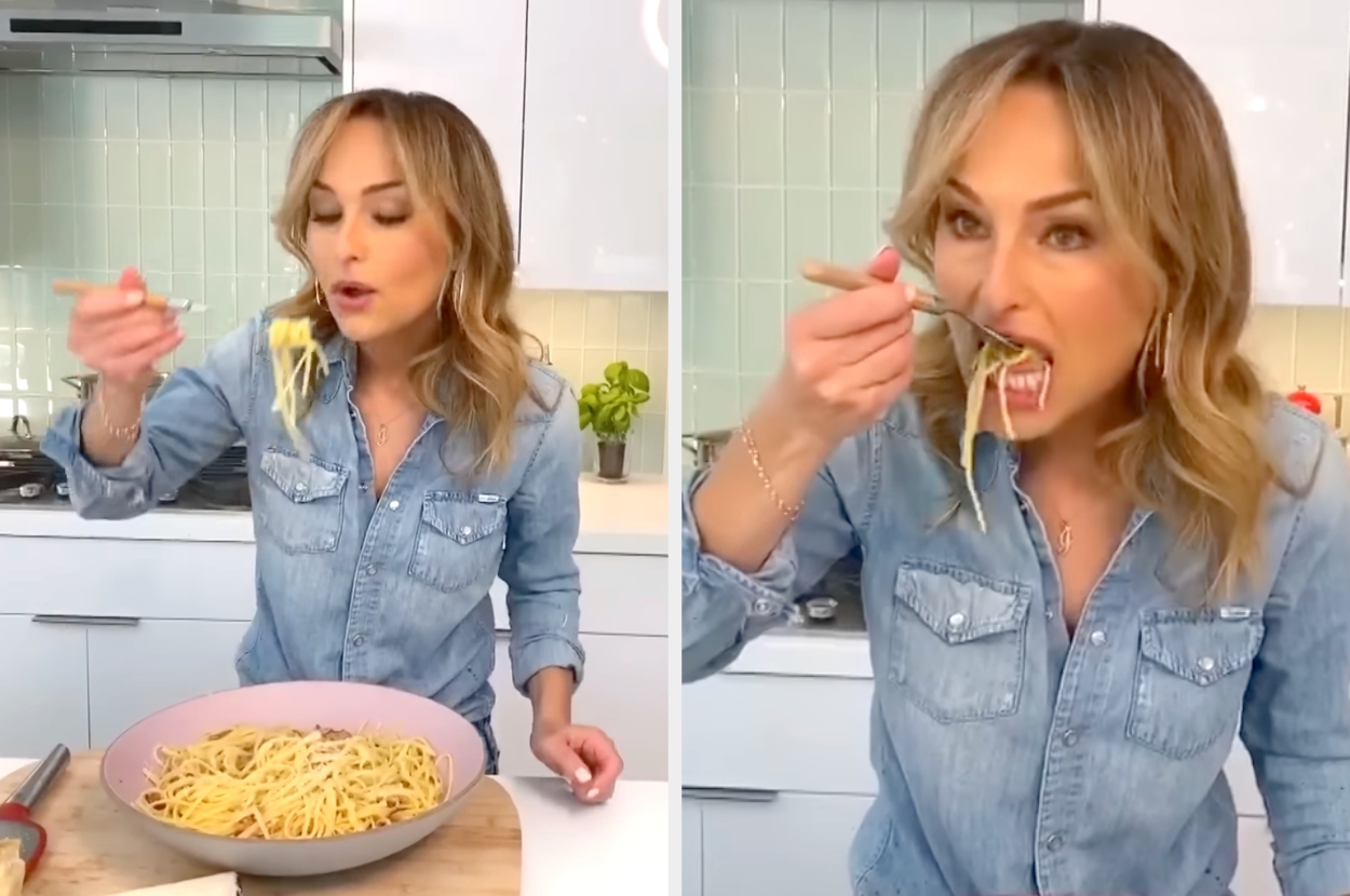 A person in a denim shirt enjoys a pasta dish in a kitchen, demonstrating a food recipe for a lifestyle article