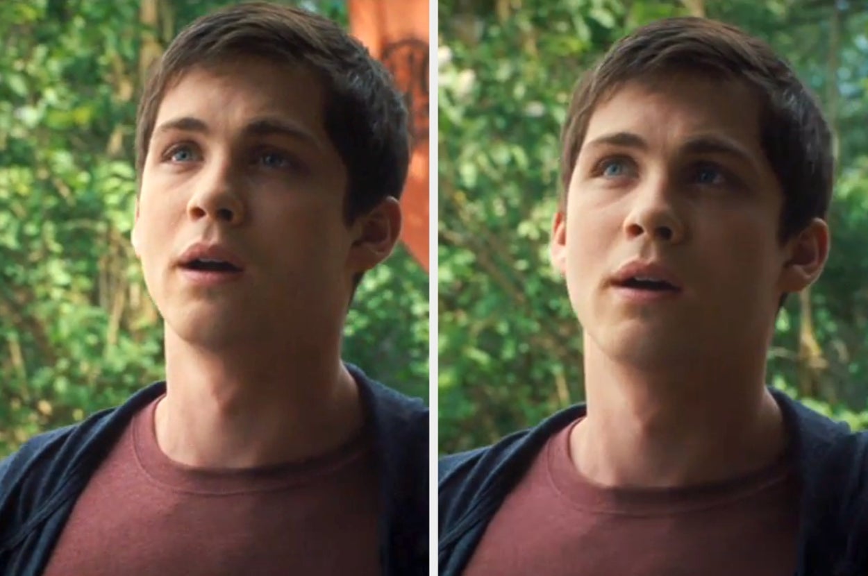 A young man outdoors looks contemplative, wearing a casual t-shirt and jacket