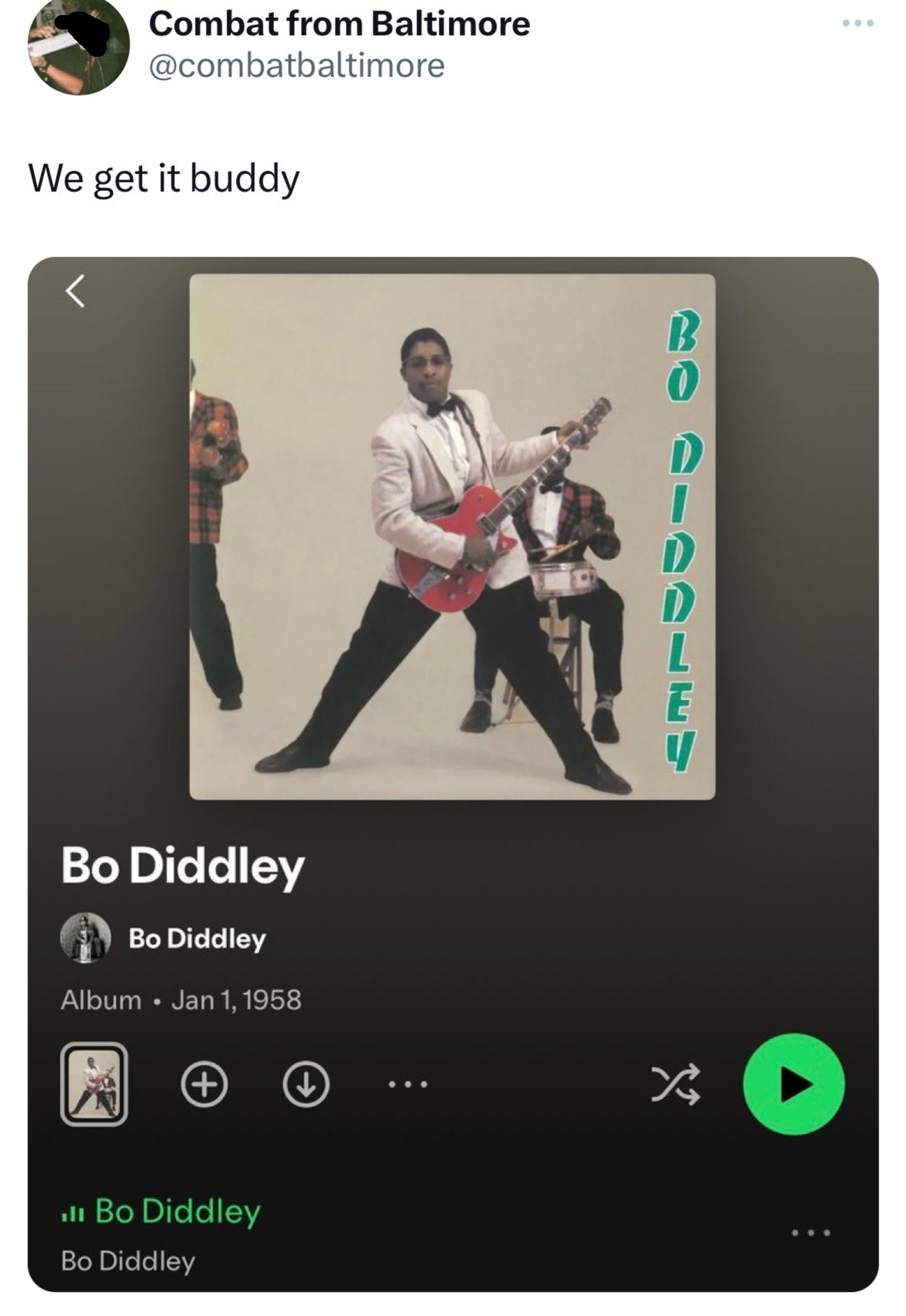 Screenshot of a tweet showing Bo Diddley&#x27;s 1958 album cover. Bo Diddley poses with a guitar. Tweet caption: &quot;We get it buddy.&quot;