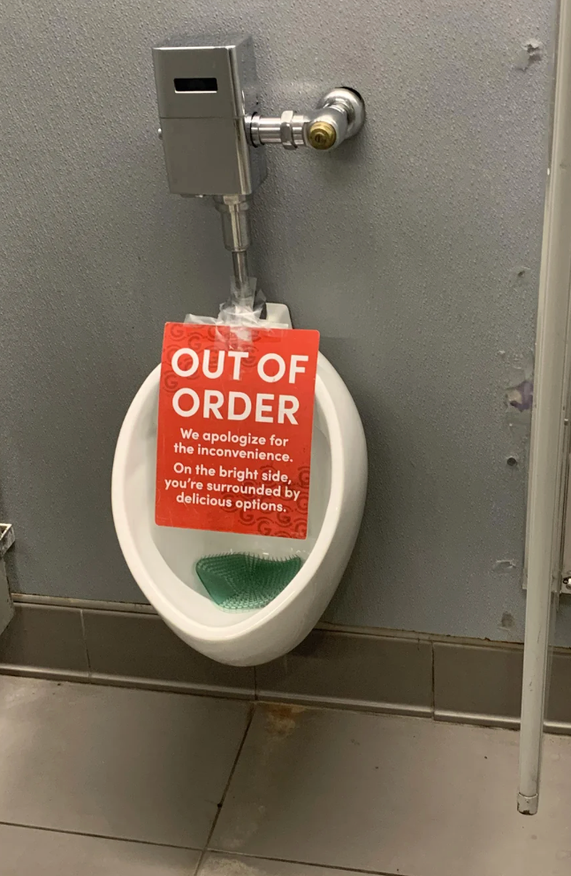 Out of bid   motion   connected  urinal with humorous connection   suggesting alternate  options