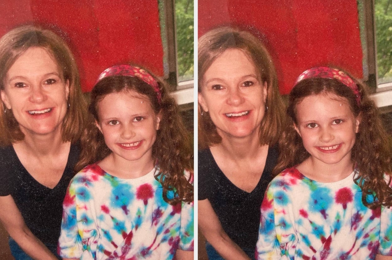 Smiling woman and child sitting together, with the child wearing a tie-dye shirt and patterned headband, providing a warm and happy family moment