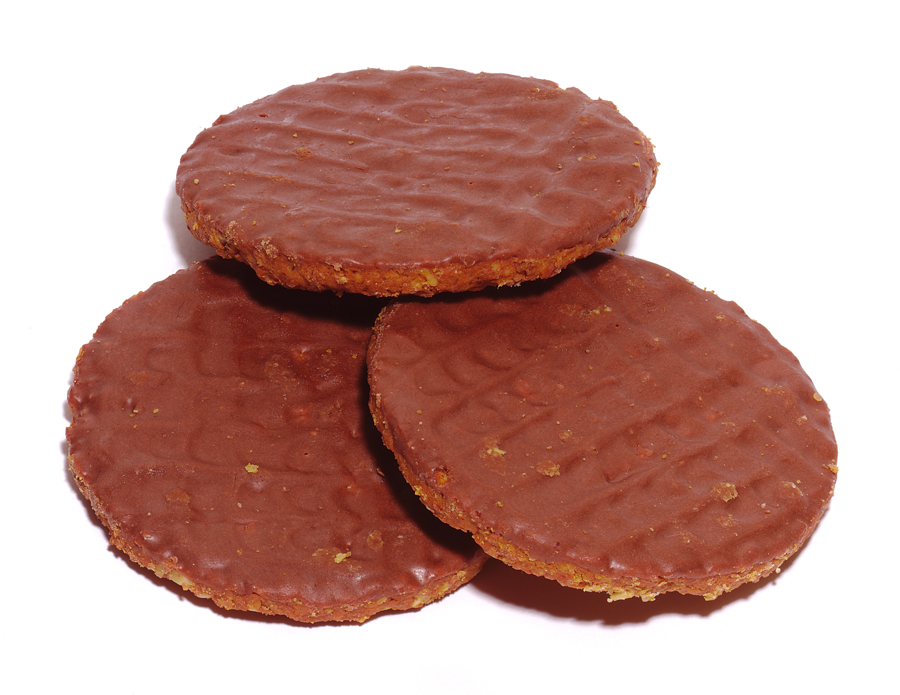 Three chocolate-covered biscuits arranged in a triangle, showcasing their textured tops and crunchy edges
