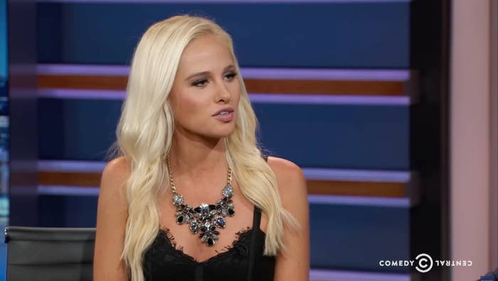 Person in a studio wearing a decorative necklace and a black top, sitting and speaking. Comedy Central logo is visible in the corner