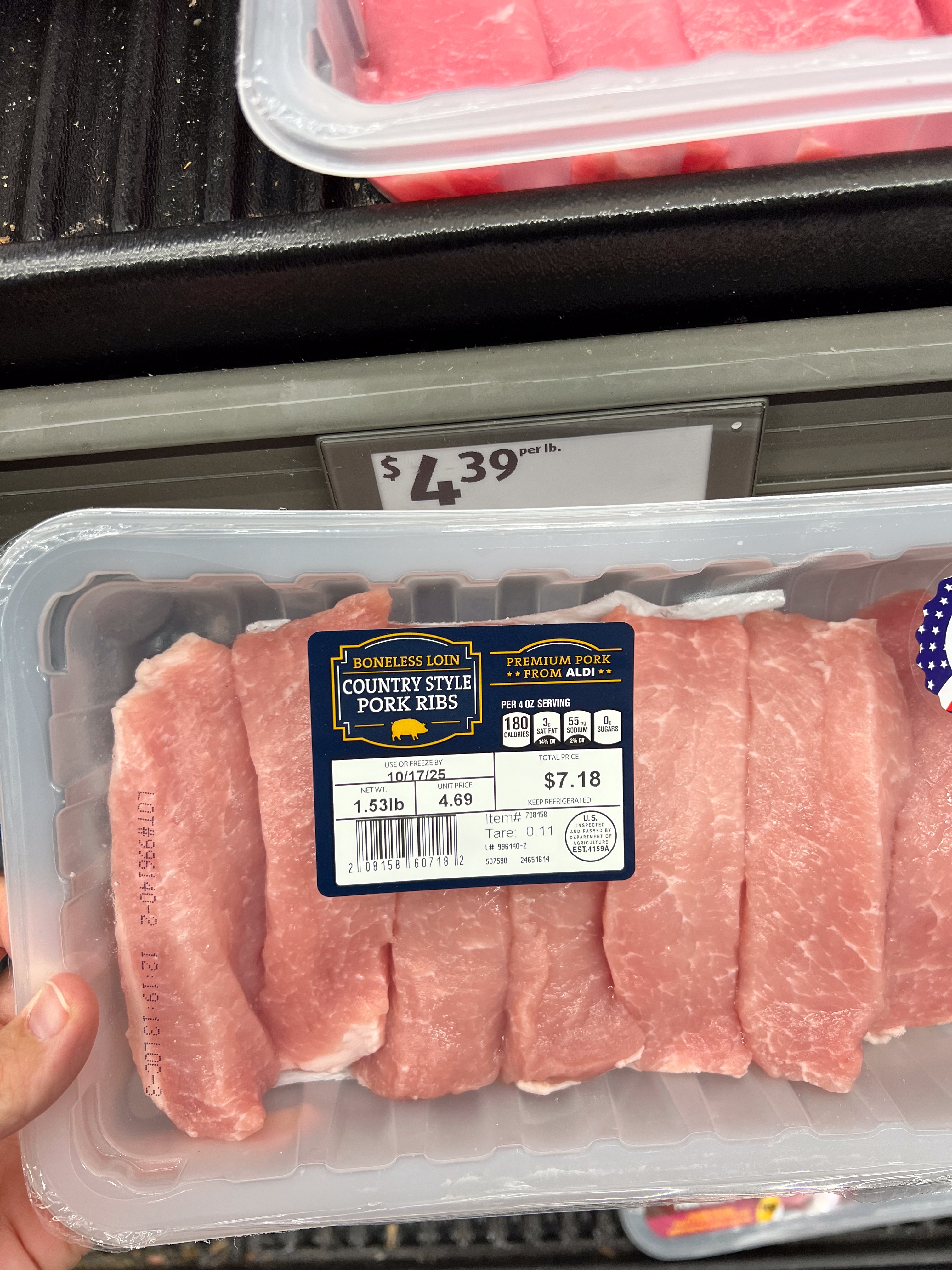 Packaged boneless loin country style pork ribs priced at $7.18