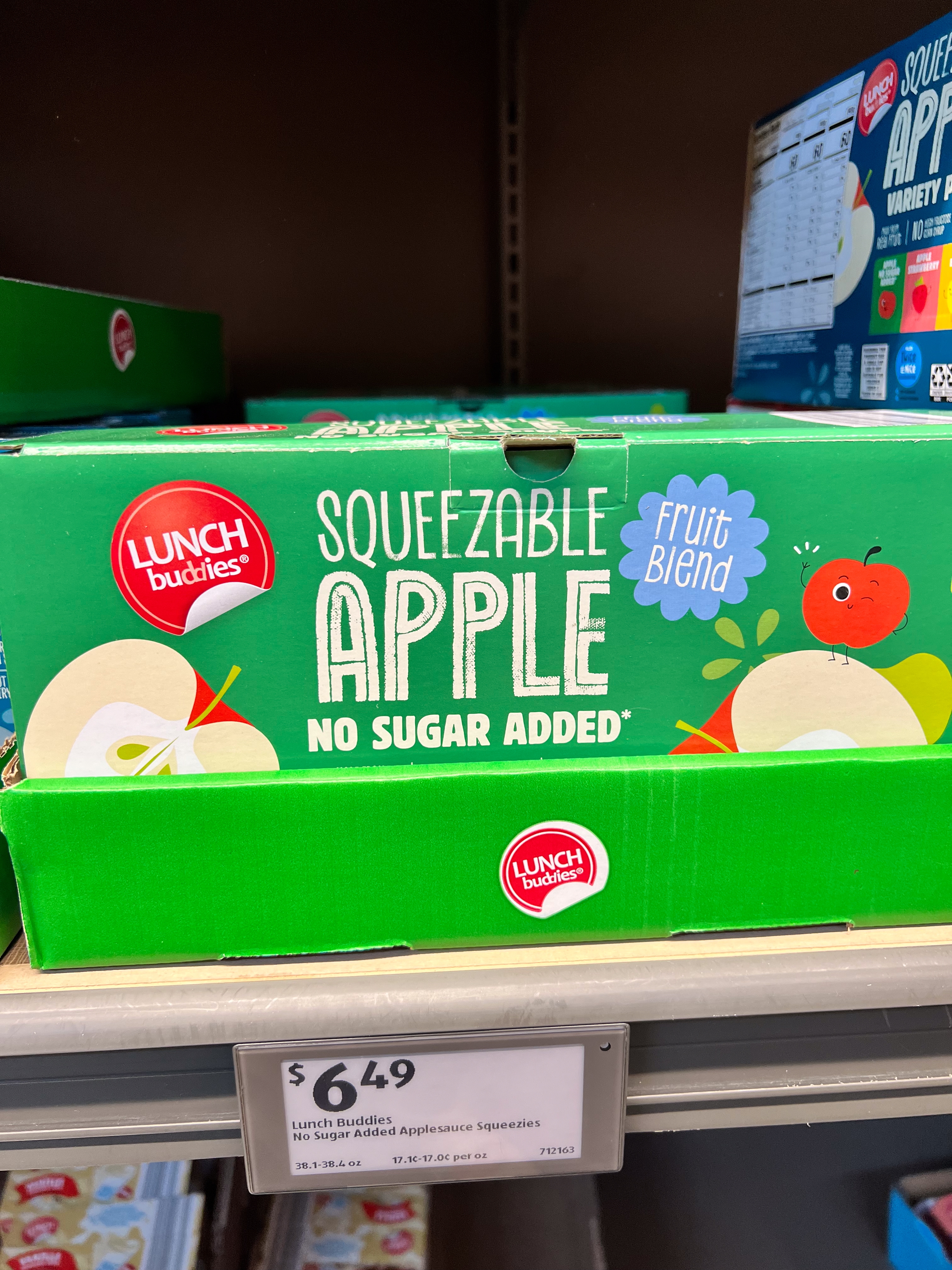 Box of Lunch Buddies squeezable applesauce displays &quot;no sugar added&quot; and &quot;fruit blend&quot; labels, priced at $6.49