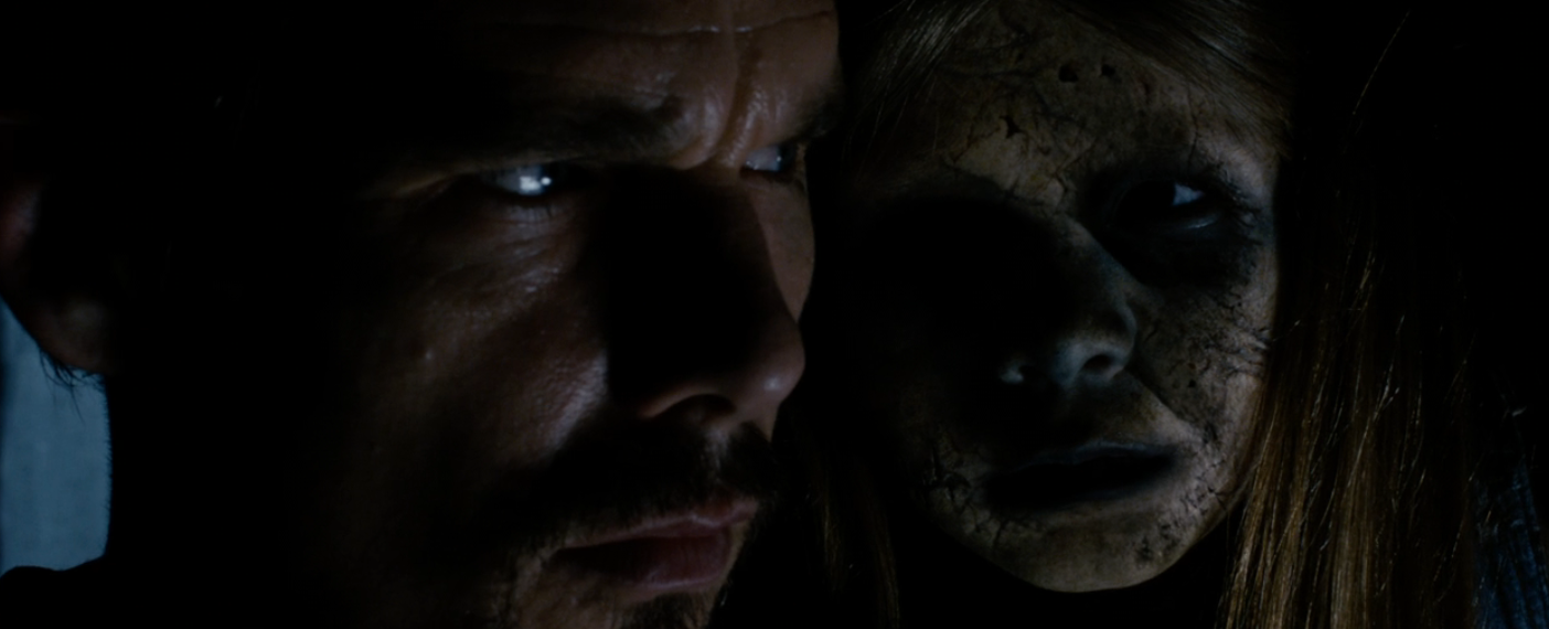 A antheral   with a tense look  is intimately  followed by a ghostly, cracked-faced fig  successful  a acheronian  setting, evoking a consciousness   of suspense