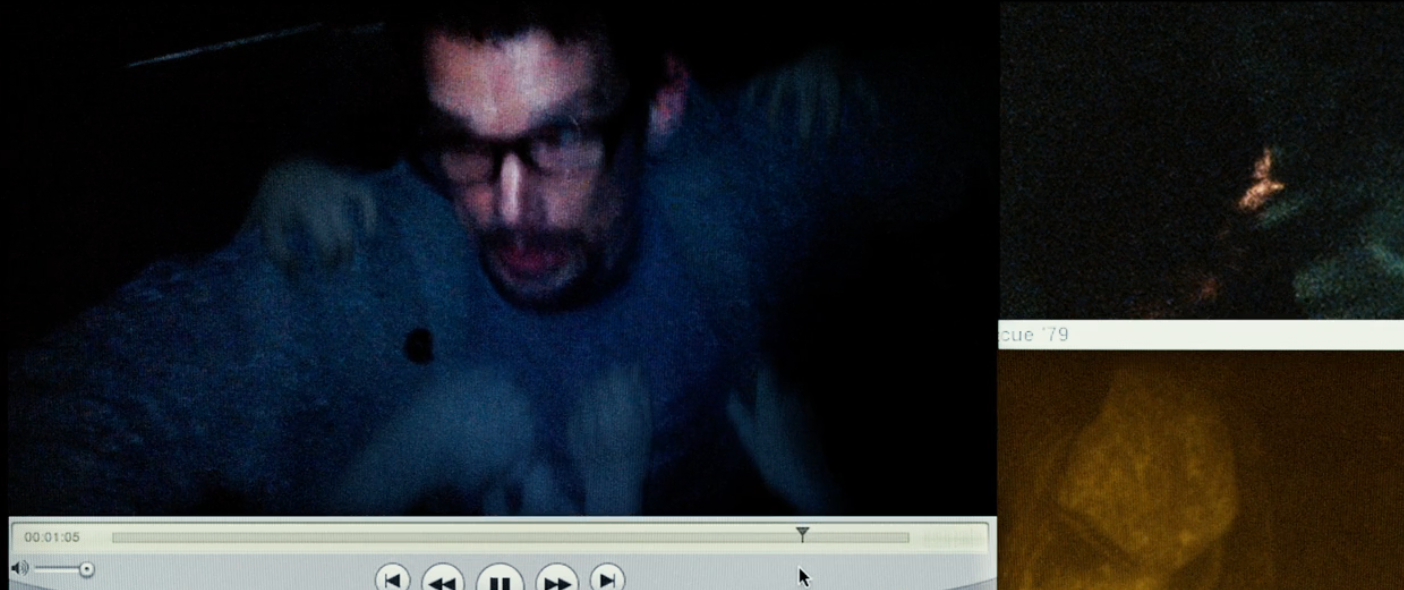 A grainy representation  appears to amusement   a idiosyncratic   successful  glasses looking distressed successful  a video subordinate    interface