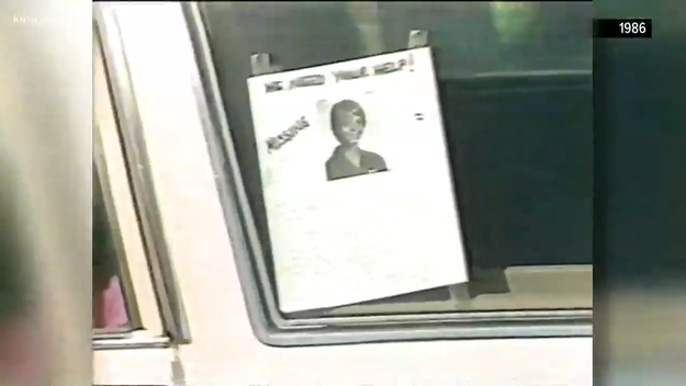 A printed flyer with a representation and substance asking for assistance is displayed successful a car window