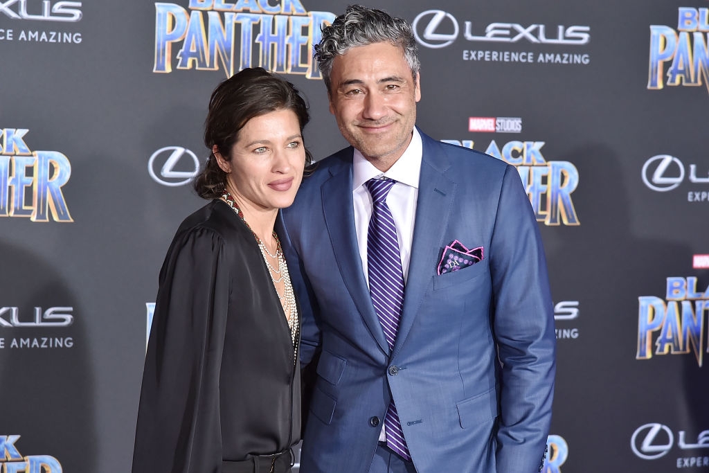 Taika and Chelsea connected a reddish carpet