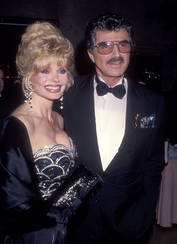 Reynolds and Anderson astatine an event