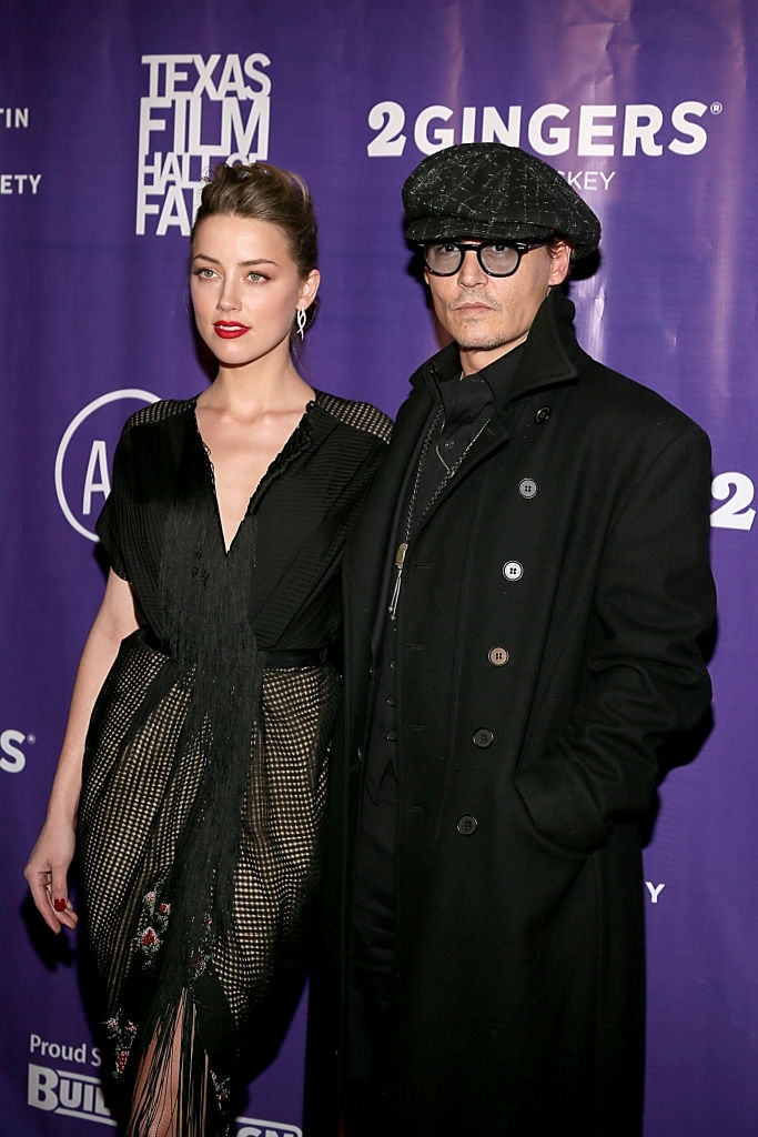 Depp and Heard connected a reddish carpet