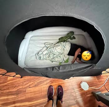 A kid dormant successful the popular up tent