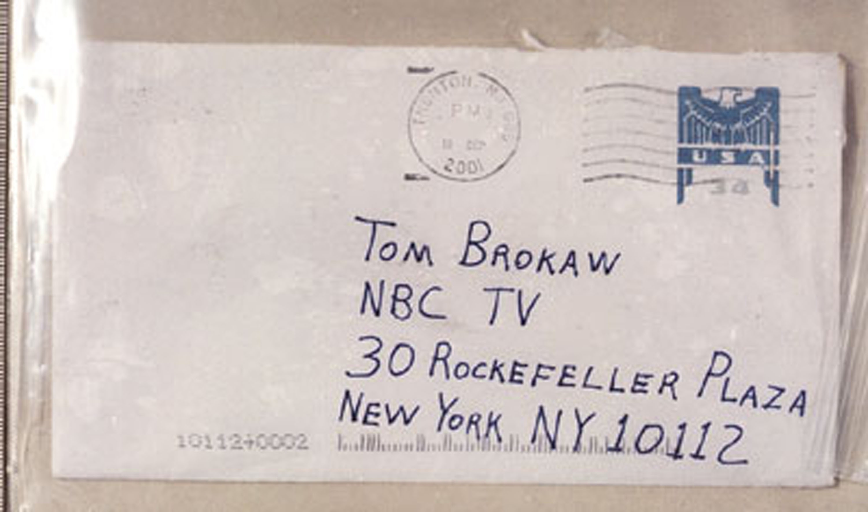 Envelope addressed to Tom Brokaw astatine  NBC TV, 30 Rockefeller Plaza, New York, with a postmark dated 2001