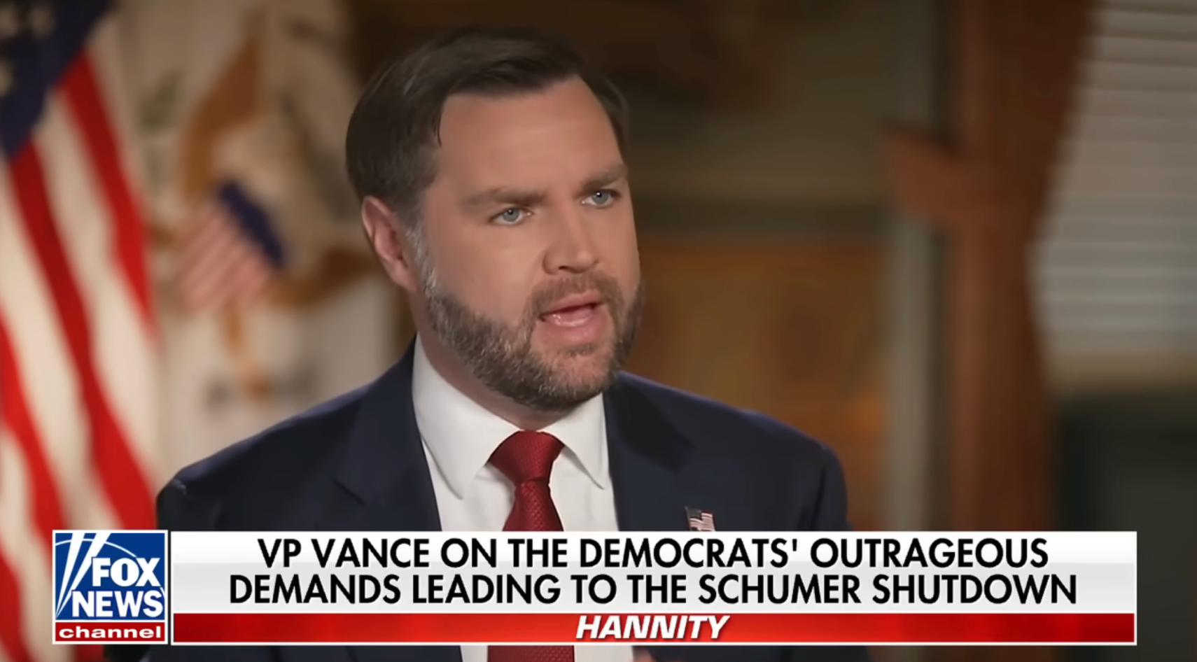 A antheral   successful  a suit   and necktie  appears connected  a quality    transmission  discussing governmental  issues related to a authorities  shutdown