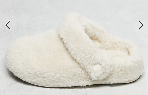 Fuzzy slipper with a cozy, plush texture designed for comfortableness and warmth